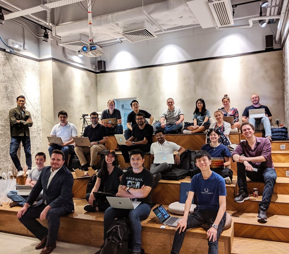 Mitchell with a group at a tech workshop